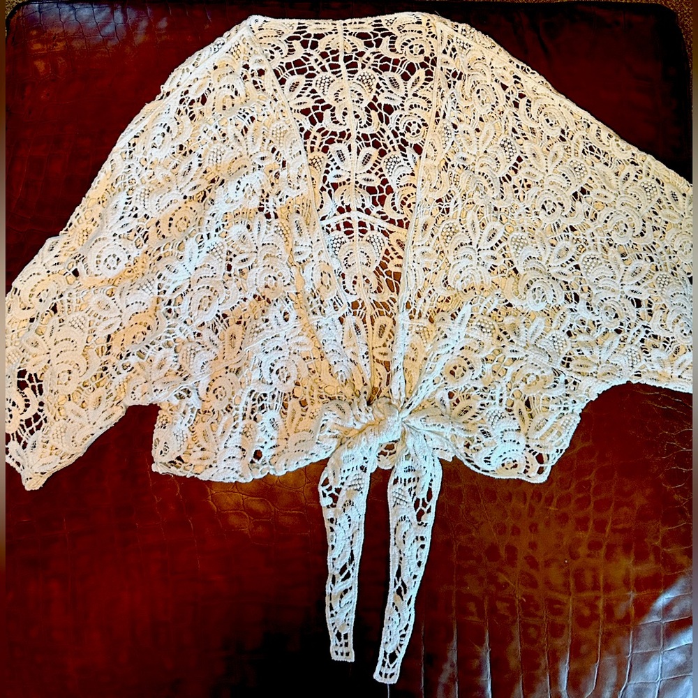 Boho Chic Ivory-colored Crochet Tie-Front cardigan/jacket with dolman sleeves.
